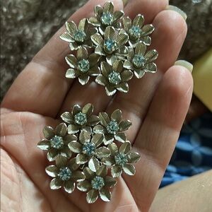 Vintage signed Coro Silver Floral clip on  Earrings with baby blue rhinestones